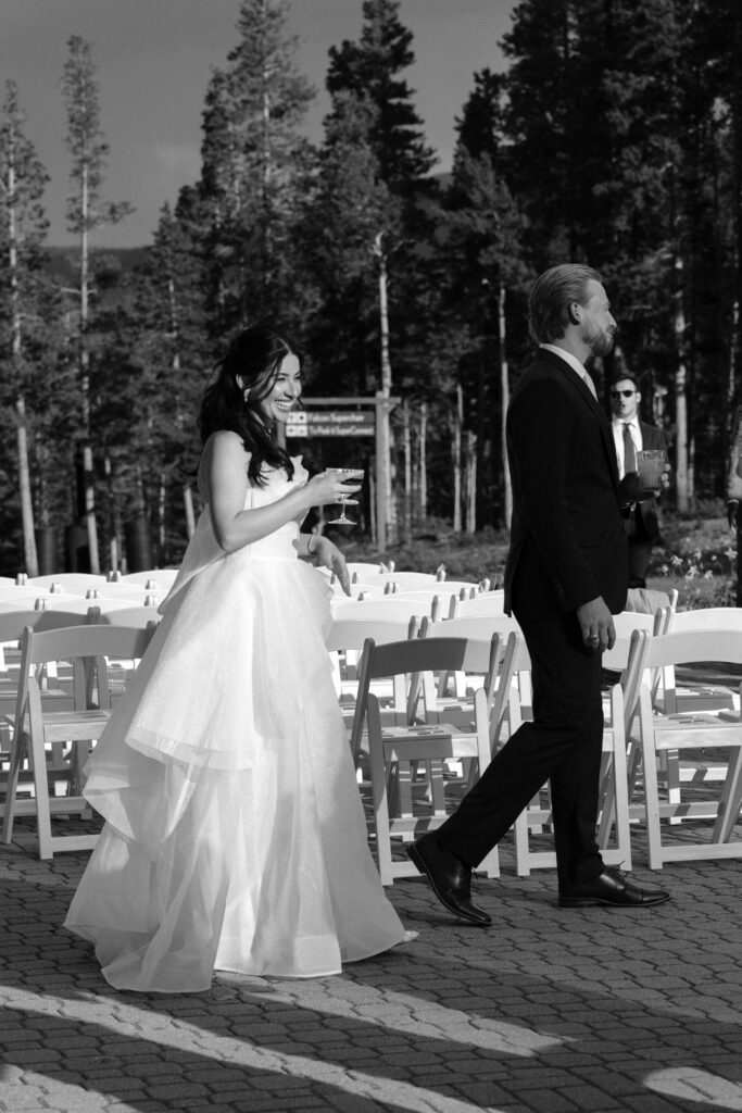bride and groom candid photos taken by Nicole Endress Photography in the mountains