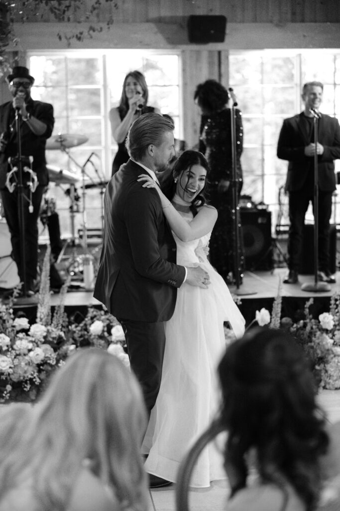 bride and groom first dance at TenMile Station Wedding Venue in Colorado