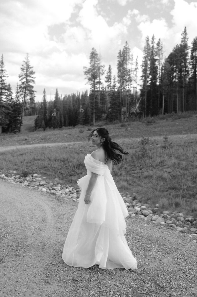 candid photo of bride in the mountains