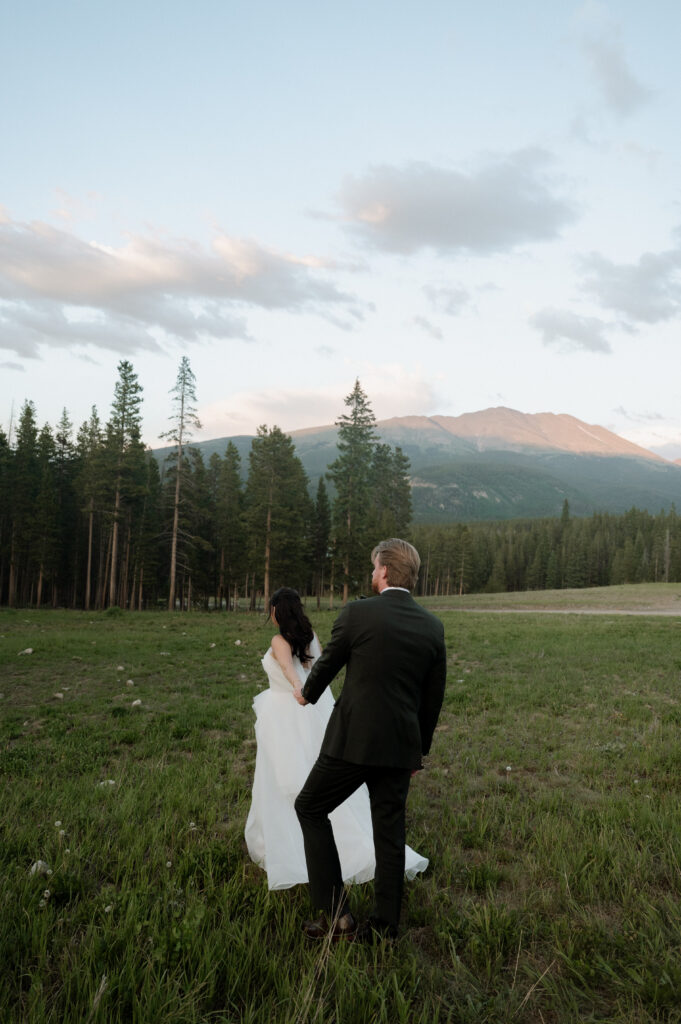 Bride and groom with a mountain view in Colorado