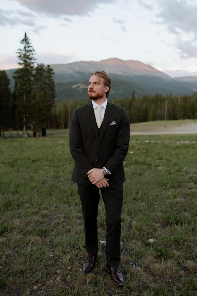 photo of groom at sunset