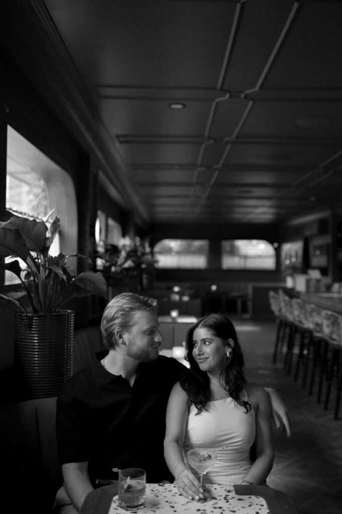 romantic bar engagement photos by Fort Worth engagement photographer