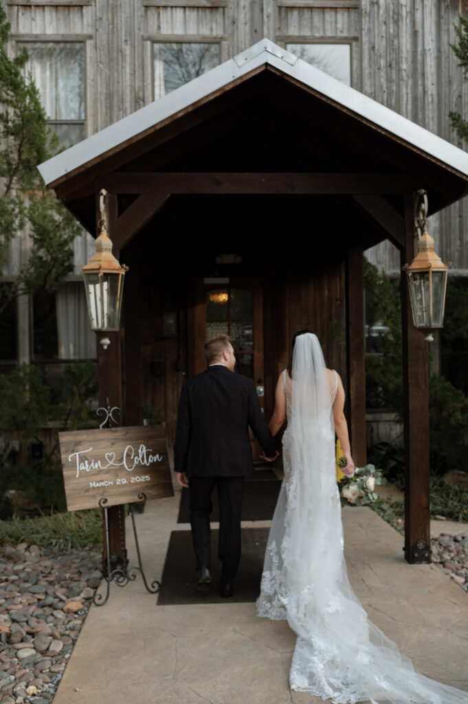 bride and groom walking into Avalon Legacy Ranch, a Rustic Dallas Wedding Venue