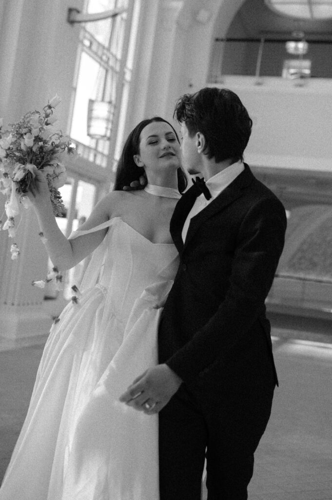 Elegant couple portrait at Bass Performance Hall by Fort Worth wedding photographer