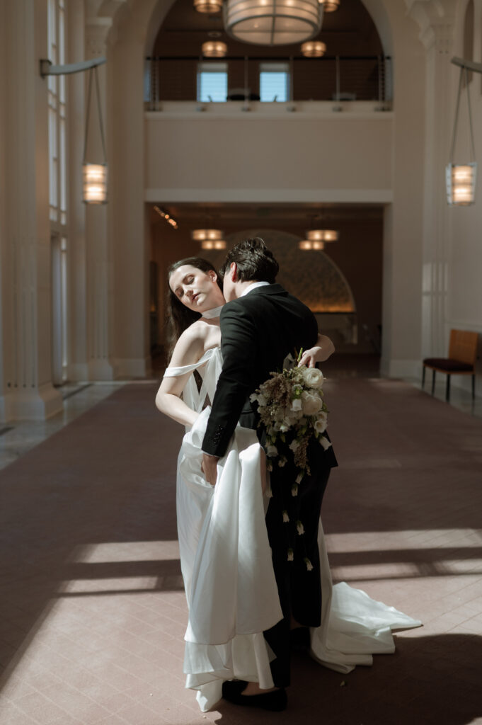 bride and groom photo in the shining light taken by DFW Wedding Photographer