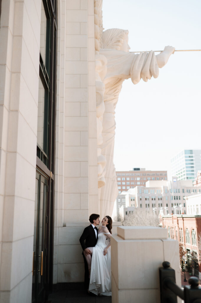 bride and groom on the balcony at Bass Performance Hall