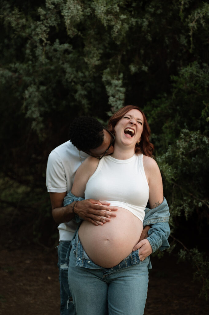 denim maternity photos taken by Fort Worth Family Photographer