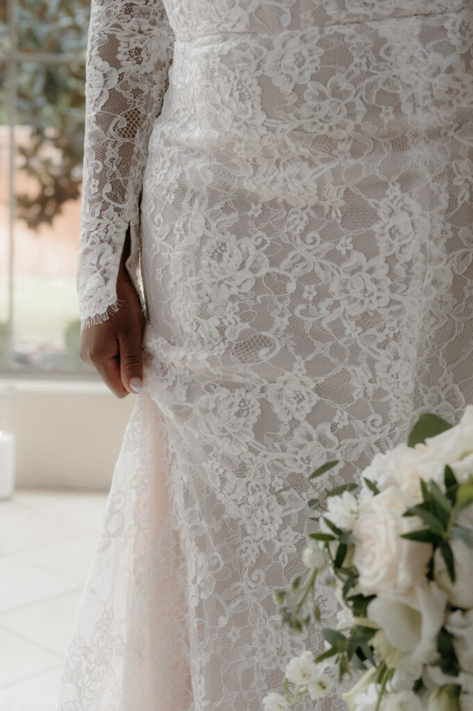 photo of lace wedding dress with sleeves