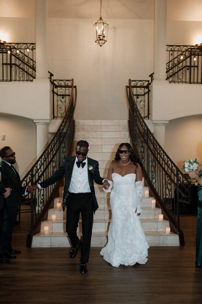 bride and groom enter reception
