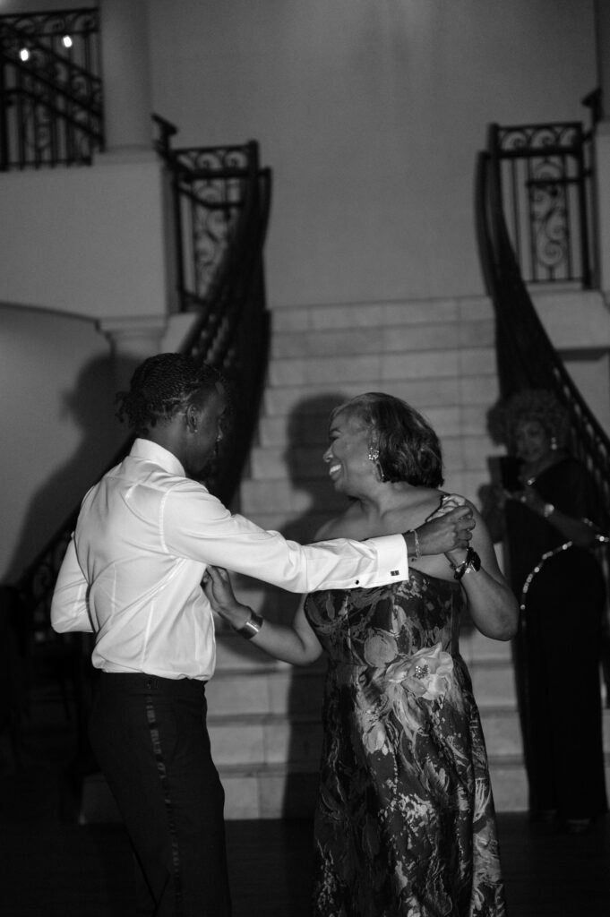 groom and mother dancing 