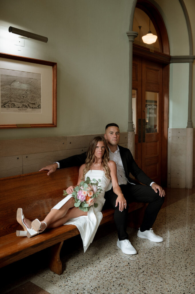 bride and groom photos taken by Nicole Endress Photography at the Tarrant County Courthouse