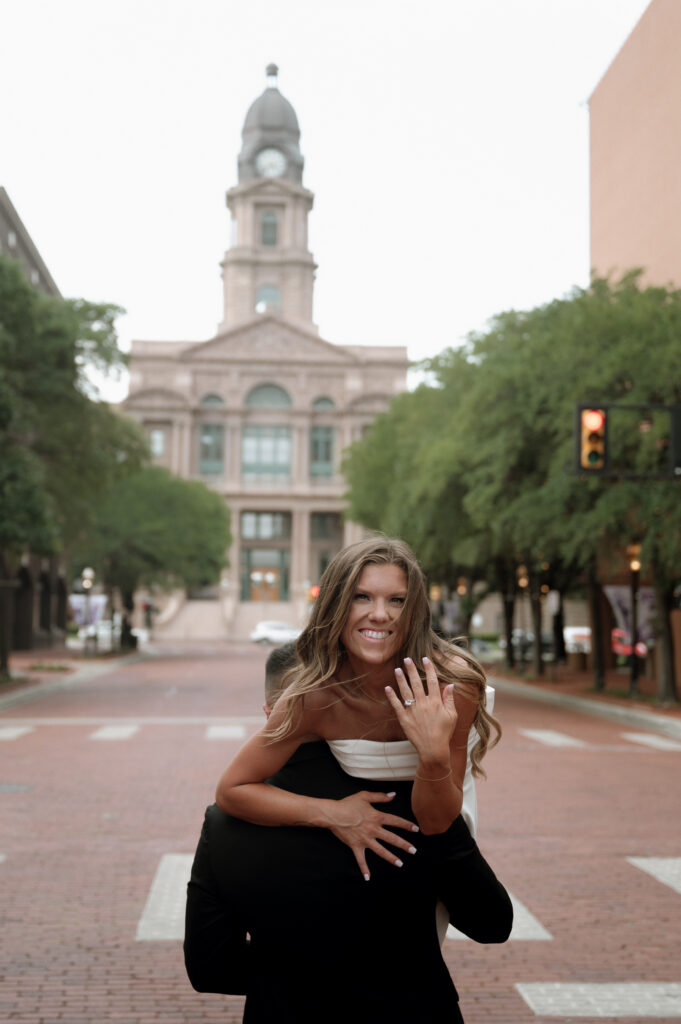 bride and groom photos outside the Tarrant County Courthouse in Fort Worth