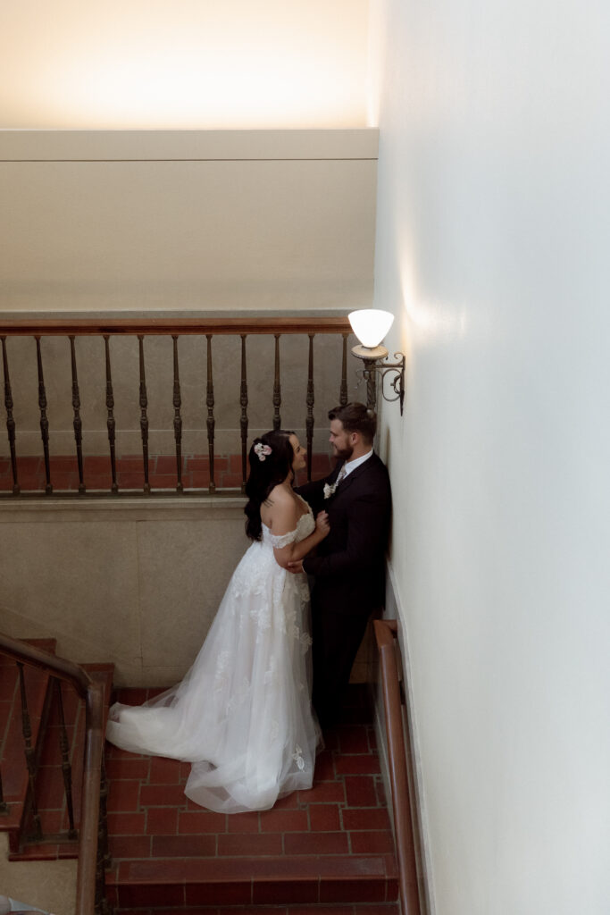 bride and groom photo in a stair case